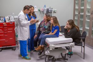 doctor speaking with parents